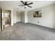 Spacious main bedroom with wall-to-wall carpeting at 1427 E Gate Dr, Venice, FL 34285