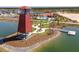 Community features a waterfront park with a clock tower and a pool at 17351 Peregrine Way, Punta Gorda, FL 33982