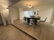 Modern dining room with glass chairs and dark table at 4469 Cunningham St, Port Charlotte, FL 33948