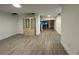 Bright dining room with hardwood floors and view into kitchen at 4469 Cunningham St, Port Charlotte, FL 33948