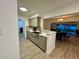 Modern kitchen with gray cabinets, quartz countertops, and stainless steel sink at 4469 Cunningham St, Port Charlotte, FL 33948