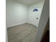 Spacious spare bedroom with light walls and wood-look flooring at 4469 Cunningham St, Port Charlotte, FL 33948