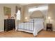 Guest bedroom with metal bed frame and wood floors at 6043 Anvil Ave, Sarasota, FL 34243