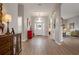 Hardwood floors in an entryway, with views to living areas at 6043 Anvil Ave, Sarasota, FL 34243