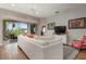 Living room with sectional sofa and sliding doors to patio at 6043 Anvil Ave, Sarasota, FL 34243