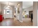 Bright and spacious entryway with hardwood floors at 6043 Anvil Ave, Sarasota, FL 34243