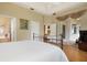 Bright bedroom with access to a private patio and full bathroom at 6043 Anvil Ave, Sarasota, FL 34243