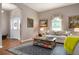 Living room with a beige sofa and a coffee table at 6043 Anvil Ave, Sarasota, FL 34243