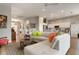 Open living room with view of kitchen and lots of natural light at 6043 Anvil Ave, Sarasota, FL 34243