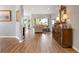 Open living room with hardwood floors and neutral colors at 6043 Anvil Ave, Sarasota, FL 34243