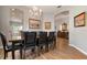 Spacious dining room with chandelier and hardwood floors at 6043 Anvil Ave, Sarasota, FL 34243
