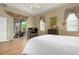 Comfortable bedroom with backyard access and plenty of natural light at 6043 Anvil Ave, Sarasota, FL 34243