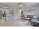 Open living space with kitchen, seating area and bar at 7329 Royal Palm Dr, New Port Richey, FL 34652