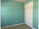 Simple bedroom featuring tile flooring and a door to the closet at 2633 Daisy Dr, North Port, FL 34289