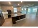 Modern kitchen with granite countertops and stainless steel appliances at 2633 Daisy Dr, North Port, FL 34289