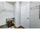 Laundry room with shelving and a door to another room at 4502 Banyan Tree Pl, Riverview, FL 33578