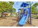 playground with slides and swings at 4502 Banyan Tree Pl, Riverview, FL 33578