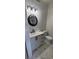 Modern powder room with sleek vanity, black accents, and geometric floor tiles at 3420 Ash St, Punta Gorda, FL 33950