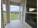 Private balcony overlooking a grassy yard and neighborhood homes at 3263 Sea Grape Dr, Hernando Beach, FL 34607