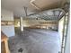 Spacious garage with built-in shelving and workbench at 3263 Sea Grape Dr, Hernando Beach, FL 34607