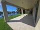 Covered patio overlooking a canal with a private dock at 3263 Sea Grape Dr, Hernando Beach, FL 34607