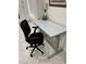 Modern home office with a standing desk and chair at 1359 Cambridge Dr, Venice, FL 34293