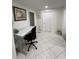Convenient home office with a standing desk and ergonomic chair at 1359 Cambridge Dr, Venice, FL 34293