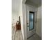 Inviting entryway with a modern door and console table at 1359 Cambridge Dr, Venice, FL 34293