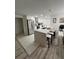Modern kitchen with stainless steel appliances and an island at 1359 Cambridge Dr, Venice, FL 34293