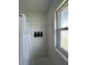 Simple bathroom with white tile and updated fixtures at 1359 Cambridge Dr, Venice, FL 34293