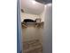 Spacious closet with wood shelving and hanging rods at 1359 Cambridge Dr, Venice, FL 34293