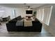Open living space showcasing sectional sofa and dining area at 1359 Cambridge Dr, Venice, FL 34293