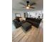 Living room with sectional sofa and ottoman at 1359 Cambridge Dr, Venice, FL 34293