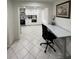View into kitchen from home office area at 1359 Cambridge Dr, Venice, FL 34293