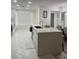 Spacious kitchen with large island, stainless steel appliances, and white cabinets at 1359 Cambridge Dr, Venice, FL 34293