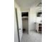 Bedroom closet with hanging rods and shelving at 1359 Cambridge Dr, Venice, FL 34293