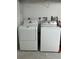 Laundry room complete with a washer and dryer at 1359 Cambridge Dr, Venice, FL 34293