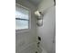 Clean bathroom with shower/tub combo and updated fixtures at 1359 Cambridge Dr, Venice, FL 34293