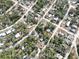 Aerial view of neighborhood with houses and trees at 9834 Miramar St, New Port Richey, FL 34654