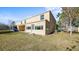The house has a spacious backyard with a covered patio, ideal for outdoor entertaining at 12843 Buffalo Run Dr, Gibsonton, FL 33534