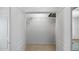 Walk-in closet with ventilated shelving for optimal organization and storage of clothes and belongings at 12843 Buffalo Run Dr, Gibsonton, FL 33534
