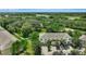 Aerial view of townhouses with surrounding green space and roadways at 12843 Buffalo Run Dr, Gibsonton, FL 33534
