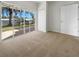 Bedroom with sliding glass doors opening to the backyard at 416 28Th W St, Palmetto, FL 34221
