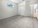Simple bedroom with carpet and large closet at 416 28Th W St, Palmetto, FL 34221