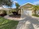 House exterior featuring a landscaped yard at 416 28Th W St, Palmetto, FL 34221