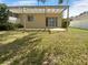 Spacious backyard with pergola and grassy area at 416 28Th W St, Palmetto, FL 34221