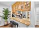 Kitchen with granite countertops and light wood cabinets at 1092 Sanabel Ne Ct, St Petersburg, FL 33702