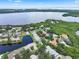 Aerial view of a neighborhood near a lake at 1092 Sanabel Ne Ct, St Petersburg, FL 33702