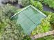 Aerial view of two well-maintained tennis courts at 1092 Sanabel Ne Ct, St Petersburg, FL 33702