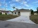 Newly constructed one-story home with a gray exterior at 1378 Wilmette St, Port Charlotte, FL 33980
